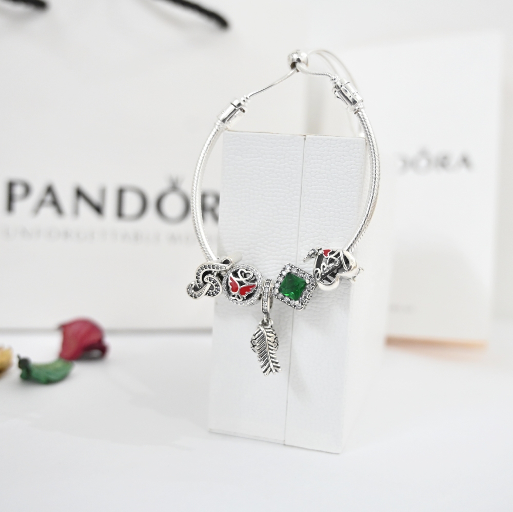 Silver pandora bracelet hi-res stock photography and images - Alamy