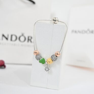 silver pandora bracelet for womens | heart and golden polished balls pandora